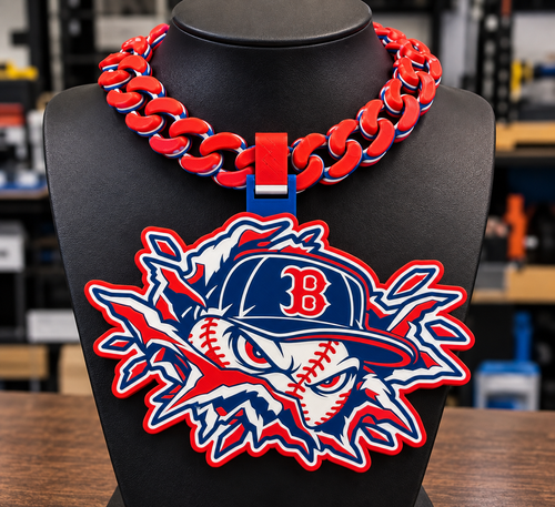 Boston Red Sox hype chain featuring a baseball character in a B-emblem cap, in red, navy, and white on a black display bust.