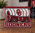 Oklahoma OU Sooners candle holder with crimson-and-white covered wagon, OU emblem, Sooners lettering, and raised top tray.