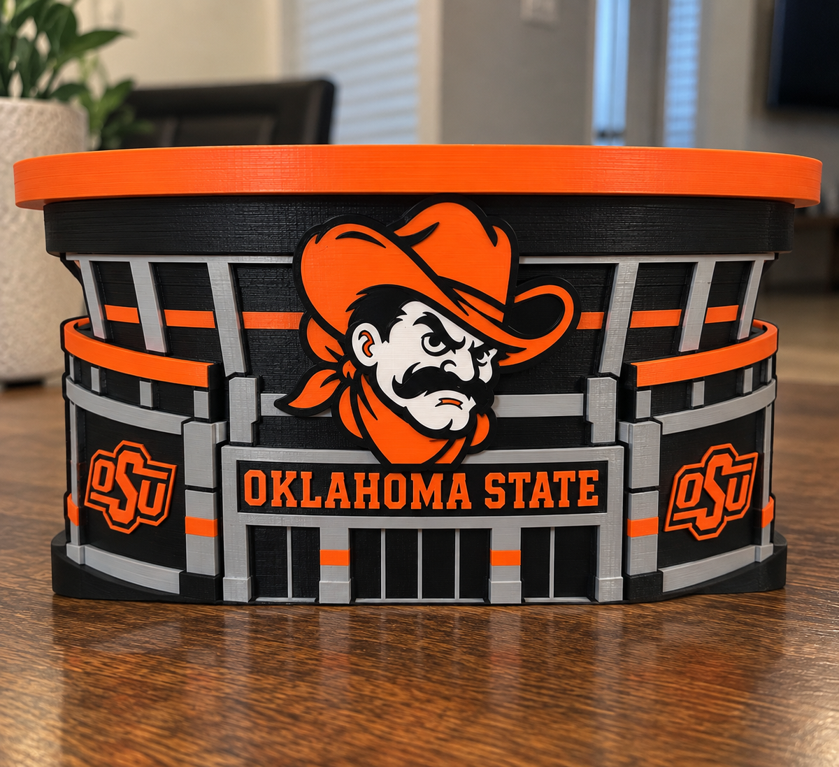 Oklahoma State OSU candle holder with orange top tray, cowboy mascot, and black-and-gray stadium-style details.