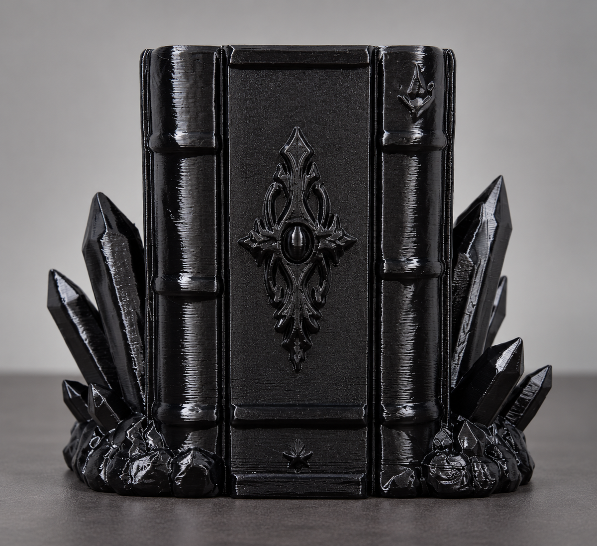 Black Gothic Pen Holder with ornate book-inspired center and pointed crystal-style details on both sides