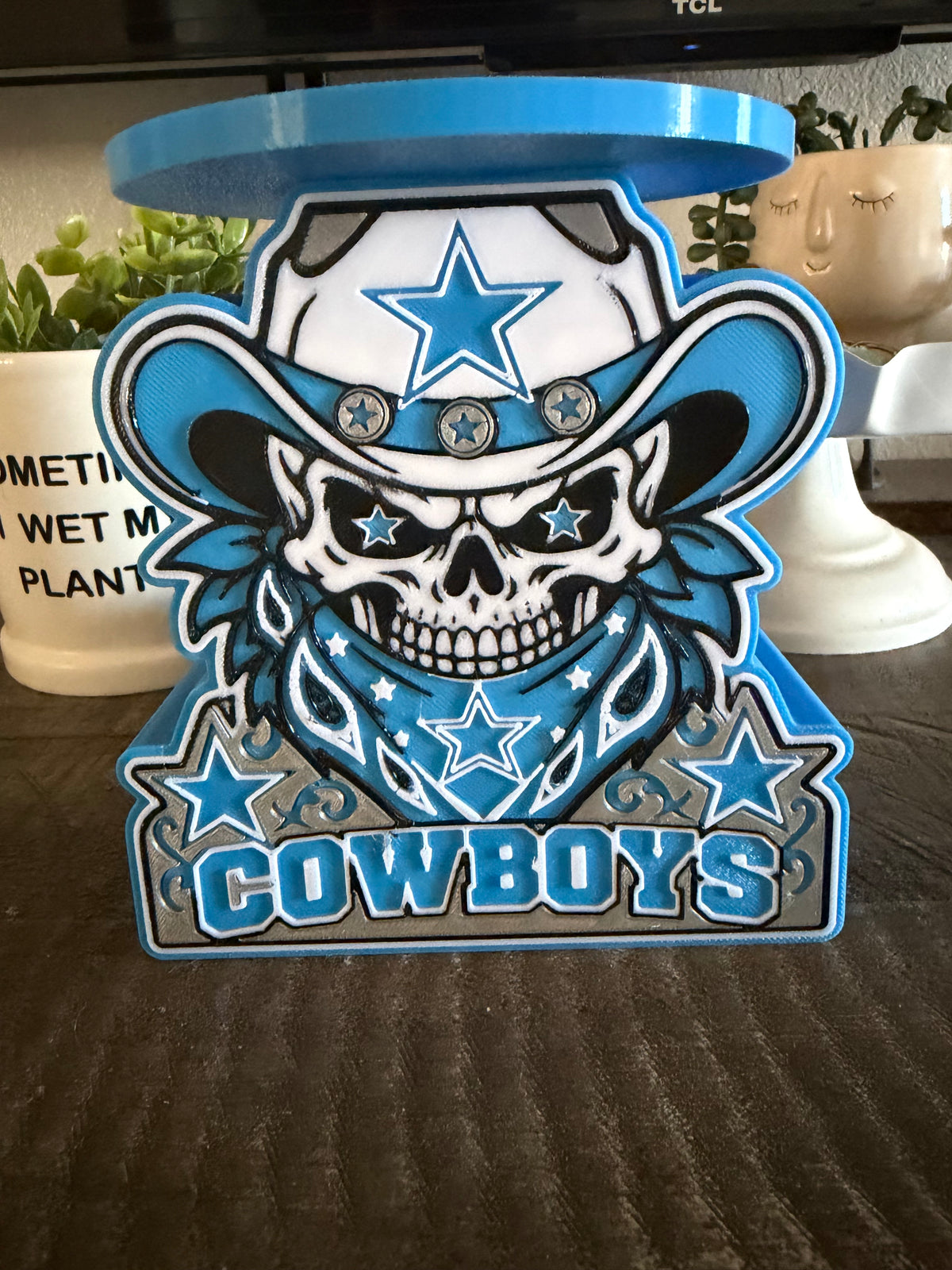Dallas Cowboys candle holder with cowboy skull, star-patterned hat and bandana, Cowboys lettering, and blue circular top tray.