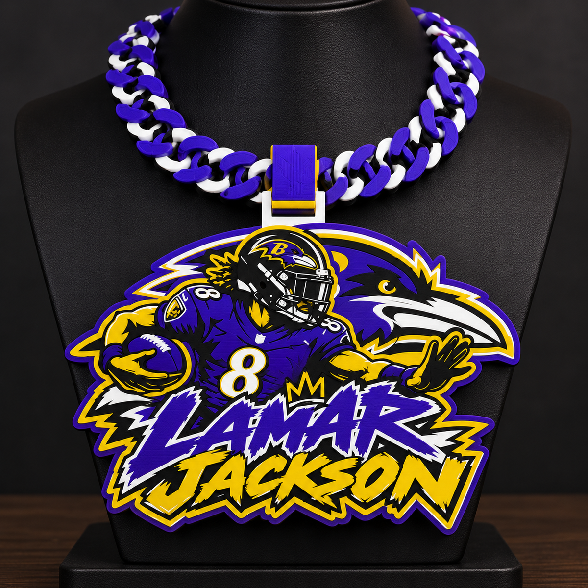 Lamar Jackson hype chain with number 8 player, Ravens imagery, and purple and yellow lettering on a black display bust.