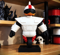 Gizmo Duck statue with white armor, a black visor, red accents, and a single wheel on a black rectangular base.